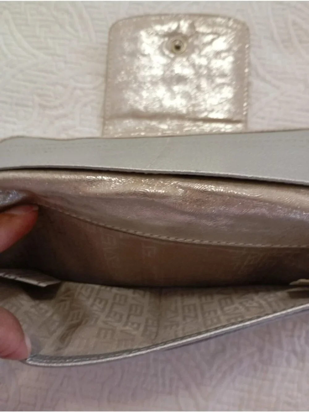 Velez Shimmering Gold Wallet With Multiple Card Slots & Snap Closure